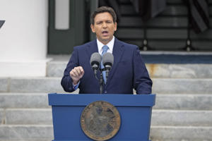 Florida Governor Ron DeSantis (right) addresses the crowd after taking the oath of office for the second term at the inauguration ceremony in Tallahassee on January 3.