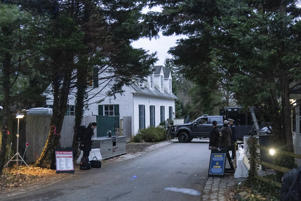 President Biden comes out. Entrance to his home in Wilmington is seen from the journalist's van on 13 January.