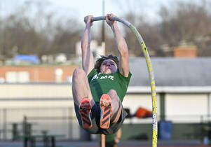 Falls Church's Nicholas DeWolf is competing in the pole vault championship at the Virginia state meet this weekend. (Jonathan Newton/Washington Post)