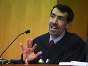 Fulton County Superior Court Judge Robert McBurney speaks during a hearing to decide whether the final report of a special grand jury investigating possible interference in the 2020 presidential election will be released Tuesday, Jan. 24, 2023, in Atlanta. (AP Photo/John Bazemore)