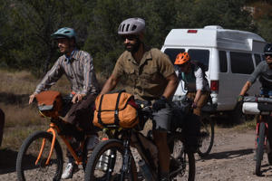 A group of cyclists, some from Tucson and Phoenix, begin a bike ride at Camp Rucker near Douglas, Arizona on October 22, 2022. Bikepacking is like a cycling adventure, like walking, but cycling. Their backpacks contain food, water, bike repair tools and other essentials for long rides.