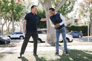 Assembly candidate Rick Chavez Zboer (left) speaks to Congressman Robert Rivas (right) at a campaign event in Beverly Hills October 23. (Dania Maxwell/Los Angeles Times)