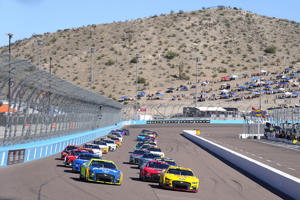 Joey Logano, 22, leads the parade during a NASCAR Cup Series auto race on Sunday, November 6, 2022, in Avondale, Arizona. (AP Photo/Rick Scuteri): NASCAR Phoenix Auto Racing