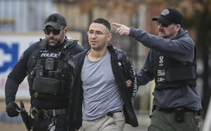 Solomon Peña, center, believed his loss in a November race for the state House was due to election fraud, authorities said. (Roberto E. Rosales/Albuquerque Journal/AP)