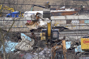 Workers continue to clean up the remaining tanks in East Palestine, Ohio, after a freight train derailed south of Norfolk on Feb. 3.