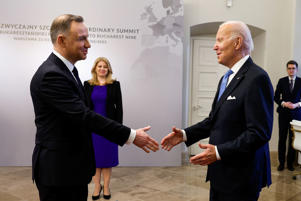 President Biden and Polish President Andrzej Duda greeted Slovakian President Zuzana Czaputova on the sidelines of the NATO Nine Summit in Bucharest on Tuesday in Warsaw.