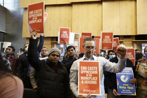 Activists during discussion of the ordinance in Seattle City Council chambers on Tuesday.