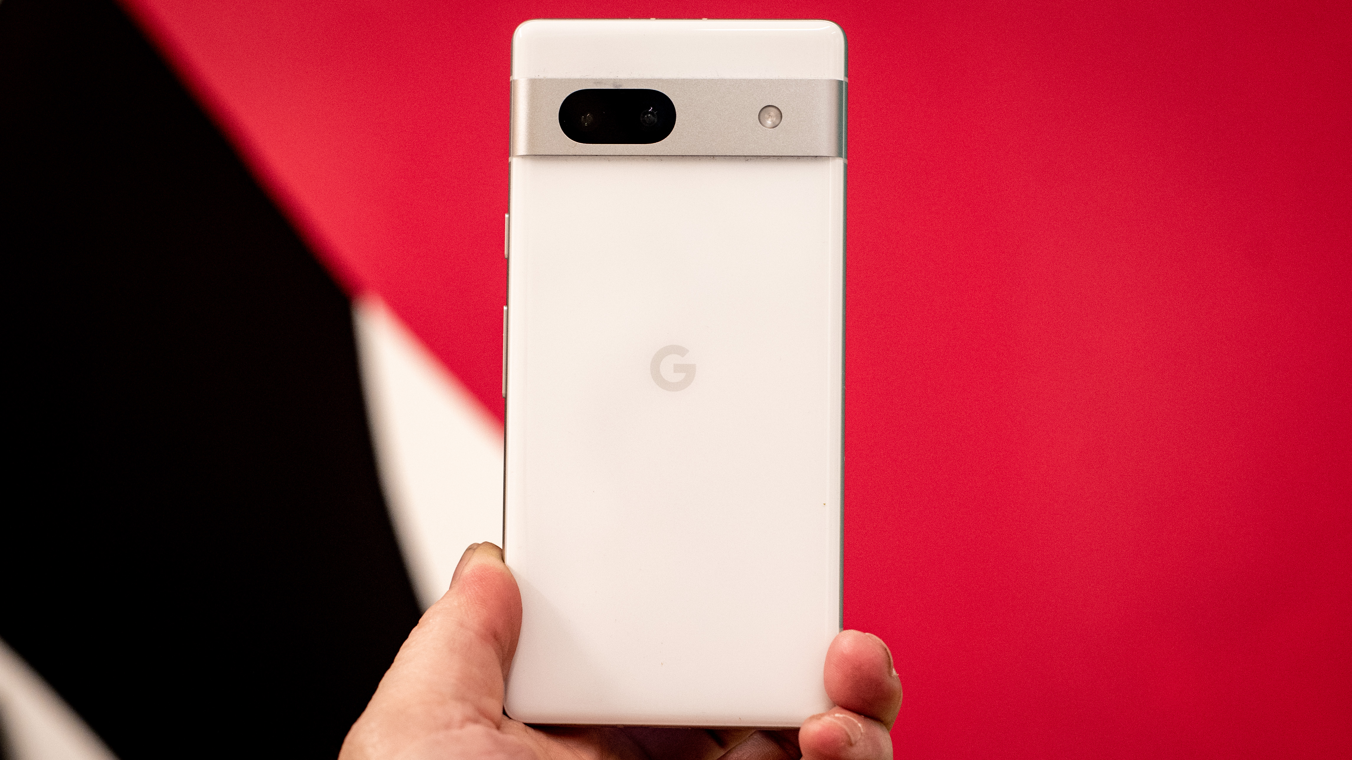 Google Pixel 7a phone showing screens camera and Android 13